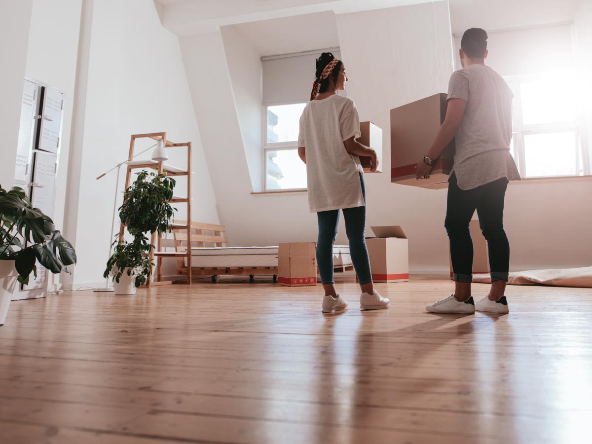 Young couple moving into their first home together.